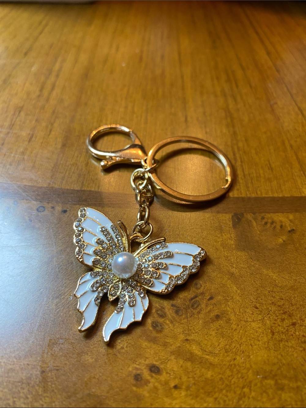 Pomina Gold Butterfly Keychain with White Enamel and Pearl Accent